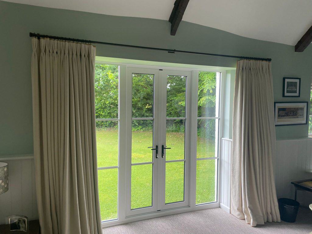 Photo of curtain pole over French Windows