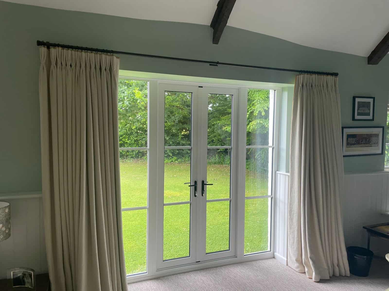 EF7314DA-9C57-4737-A147-1448F5D61BD4 Photo of curtain pole over French Windows