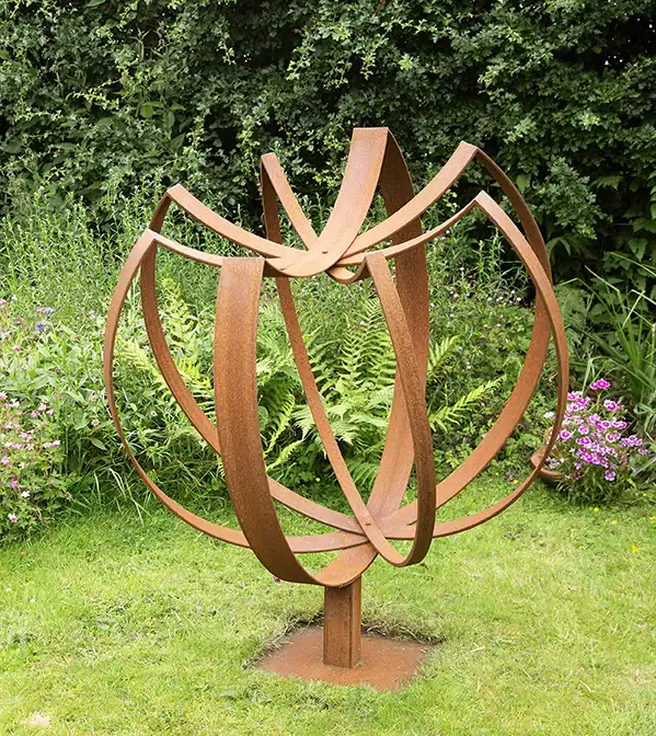 Large ornamental wrought iron garden sphere Image of a large wrought iron ornamental garden sphere